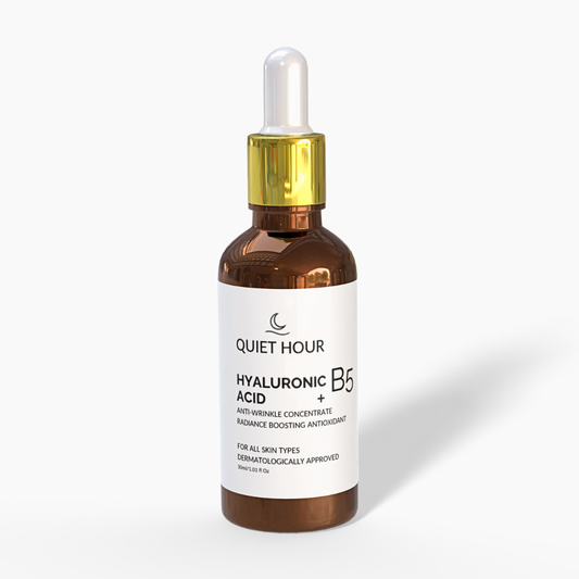 Brown glass dropper bottle with white label on a white background